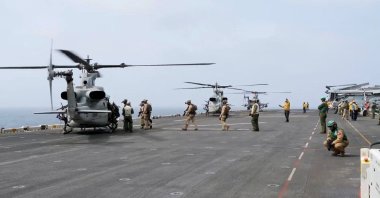 Military helicopters and personnel operate in a location given as the Arabian Sea in this screengrab obtained from a video released by U.S. Central Command (CENTCOM), July 25, 2026. (Handout via Reuters)
