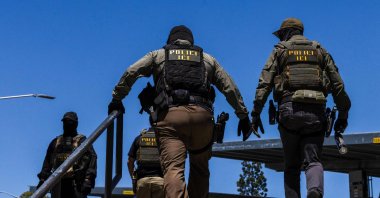 Immigration and Customs Enforcement (ICE) agents walk outside the Ventura County Government Center in Ventura, California, July 27, 2026. (AFP Photo)