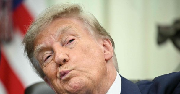 U.S. President Donald Trump looks on before signing an executive order calling for more research and flexibility on vaccines, in the Oval Office of the White House, Washington, U.S., Aug. 10, 2026. (AFP Photo)