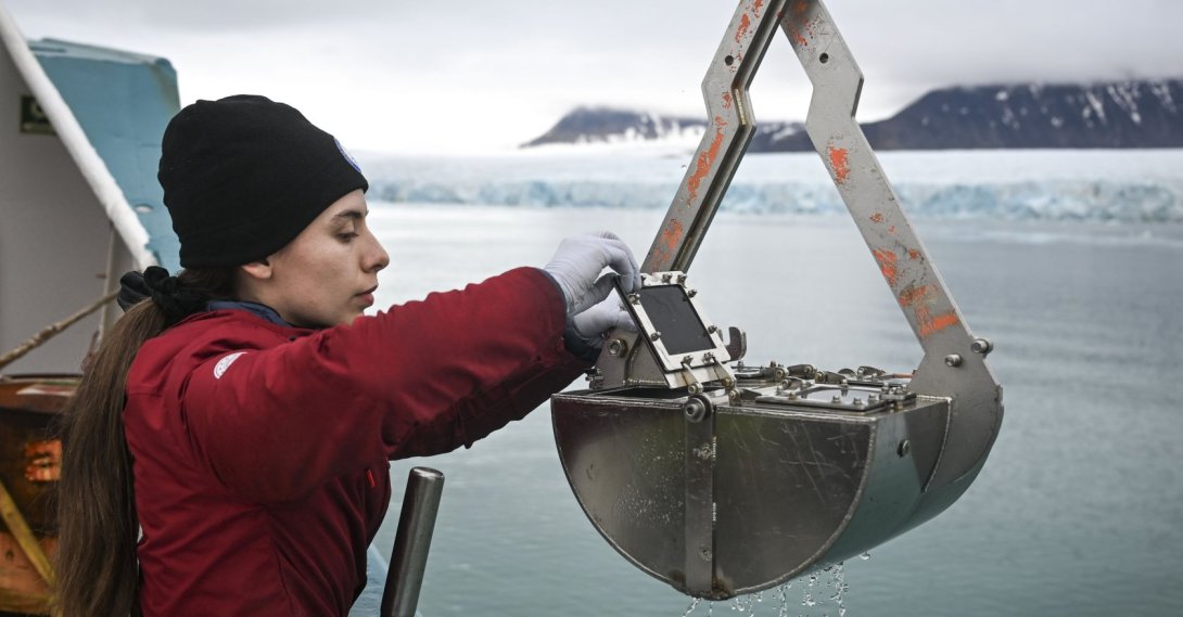 A Turkish scientist examines samples collected from the depths of the Arctic during an expedition in Svalbard, Norway, Aug. 11, 2026. (AA Photo)