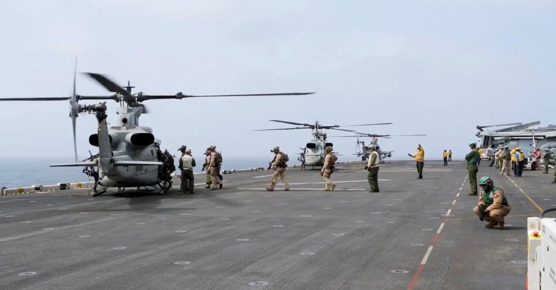 Military helicopters and personnel operate in a location given as the Arabian Sea in this screengrab obtained from a video released by U.S. Central Command (CENTCOM), July 25, 2026. (Handout via Reuters)