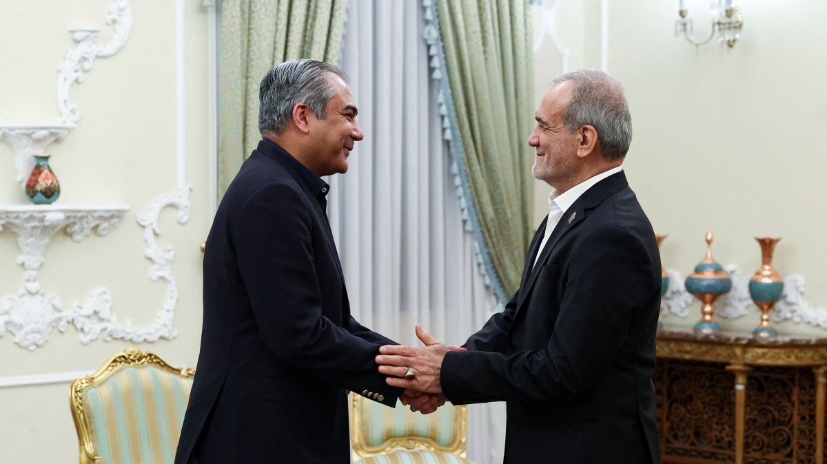 Iranian President Masoud Pezeshkian (R) greets Pakistan's Interior Minister Syed Mohsin Raza Naqvi during their meeting in Tehran, Iran, Aug. 11, 2026. (AFP Photo)