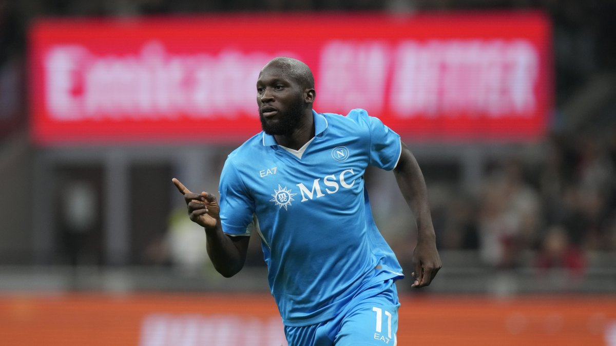 Napoli's Romelu Lukaku celebrates after scoring his side's opening goal during the Serie A soccer match between AC Milan and Napoli at the San Siro Stadium, Milan, Italy, Oct. 29, 2024. (AP Photo)