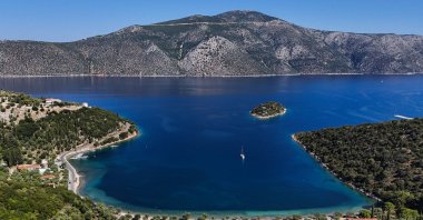 An aerial view of Dexa Beach on the island of Ithaca, where legend holds that Odysseus landed upon finally returning home, Greece, Aug. 3, 2026. (AFP Photo)
