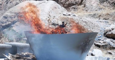 The PKK terrorist group's weapons are burned during a ceremony, Sulaimaniyah, Iraq, July 11, 2025. (AFP Photo)