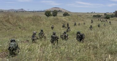 Israeli troops take position during training in the Israeli-occupied Golan Heights, Syria, May 8, 2024. (AP Photo)