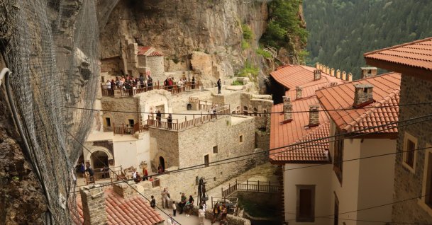 Visitors explore the Sümela Monastery, a historic rock-cut monastery built into the cliffs of the Altındere Valley, Trabzon, northeastern Türkiye, July 29, 2026. (Photo by Buğra Çakmak)