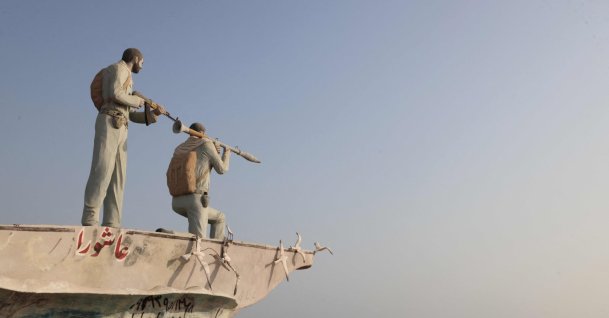 A sculpture overlooking the Strait of Hormuz is seen along the seafront in the port city of Bandar Abbas, in southern Iran, Aug. 10, 2026. (AFP Photo)
