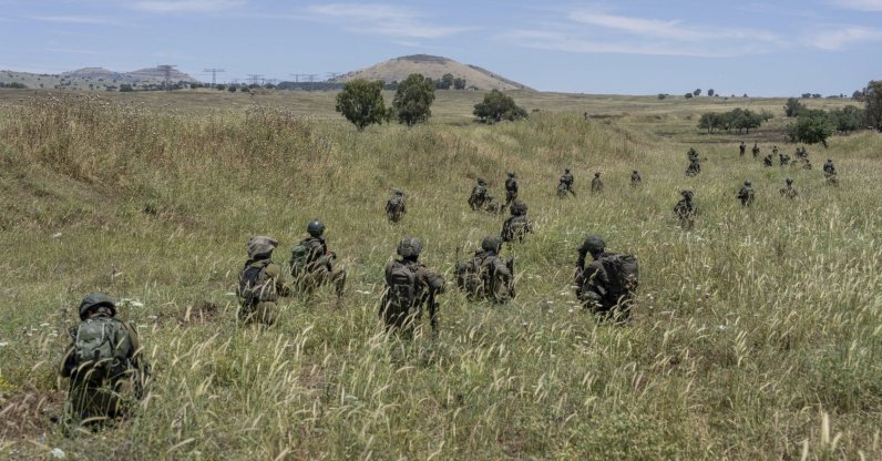 Israeli troops take position during training in the Israeli-occupied Golan Heights, Syria, May 8, 2024. (AP Photo)