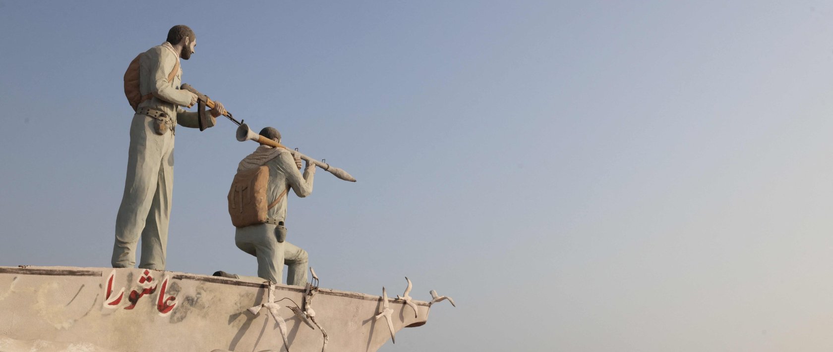 A sculpture overlooking the Strait of Hormuz is seen along the seafront in the port city of Bandar Abbas, in southern Iran, Aug. 10, 2026. (AFP Photo)