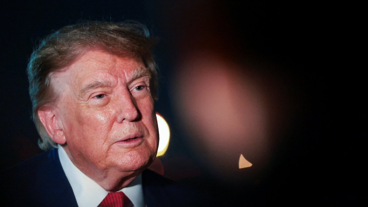 U.S. President Donald Trump looks on as he speaks to members of the media after disembarking Air Force One at Joint Base Andrews, Maryland, U.S., Aug. 11, 2026. (Reuters Photo)