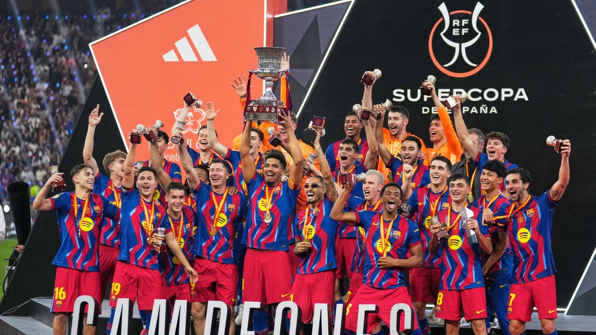 Barcelona players celebrate after winning the Spanish Super Cup final soccer match against Real Madrid at King Abdullah Sports City Stadium, Jeddah, Saudi Arabia, Jan. 11, 2026. (AP Photo)