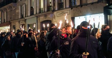 Far-right demonstrators, many with their faces concealed, take to the streets, Paris, France, Jan. 18 2026. (Shutterstock Photo)