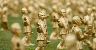A view of some of the 400 gold colored plastic Mozart sculptures by German artist Ottmar Hoerl from Nuremberg for the 270th birthday of composer Wolfgang Amadeus Mozart, Salzburg, Austria, July 15, 2026. (AP Photo)