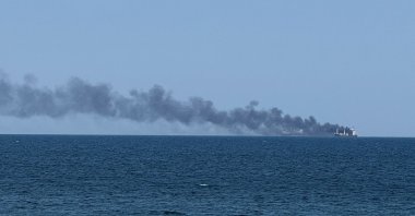Smoke rises from a civilian vessel on fire amid Russia's attack on Ukraine in Odesa, Ukraine, July 19, 2026. (Reuters Photo)