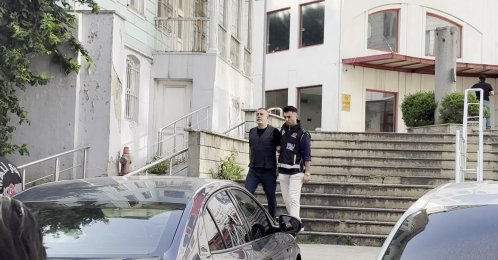 Haluk Levent is escorted for a health check after being detained in an Ahbap Association corruption probe, Istanbul, Türkiye, July 15, 2026. (IHA Photo)