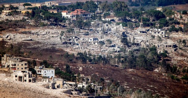 Destruction carried out by the invading Israeli military is pictured in the village of Arnoun, as seen from nearby Marjayoun (Marjeyoun) in southern Lebanon, Aug. 11, 2026. (AFP Photo)