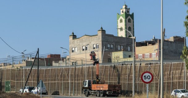 Workers reinforce the perimeter fence along the border in Melilla, Spain, Aug. 6, 2026. (EPA Photo)