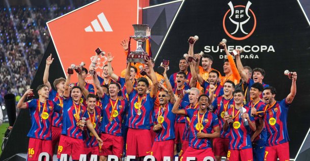 Barcelona players celebrate after winning the Spanish Super Cup final soccer match against Real Madrid at King Abdullah Sports City Stadium, Jeddah, Saudi Arabia, Jan. 11, 2026. (AP Photo)