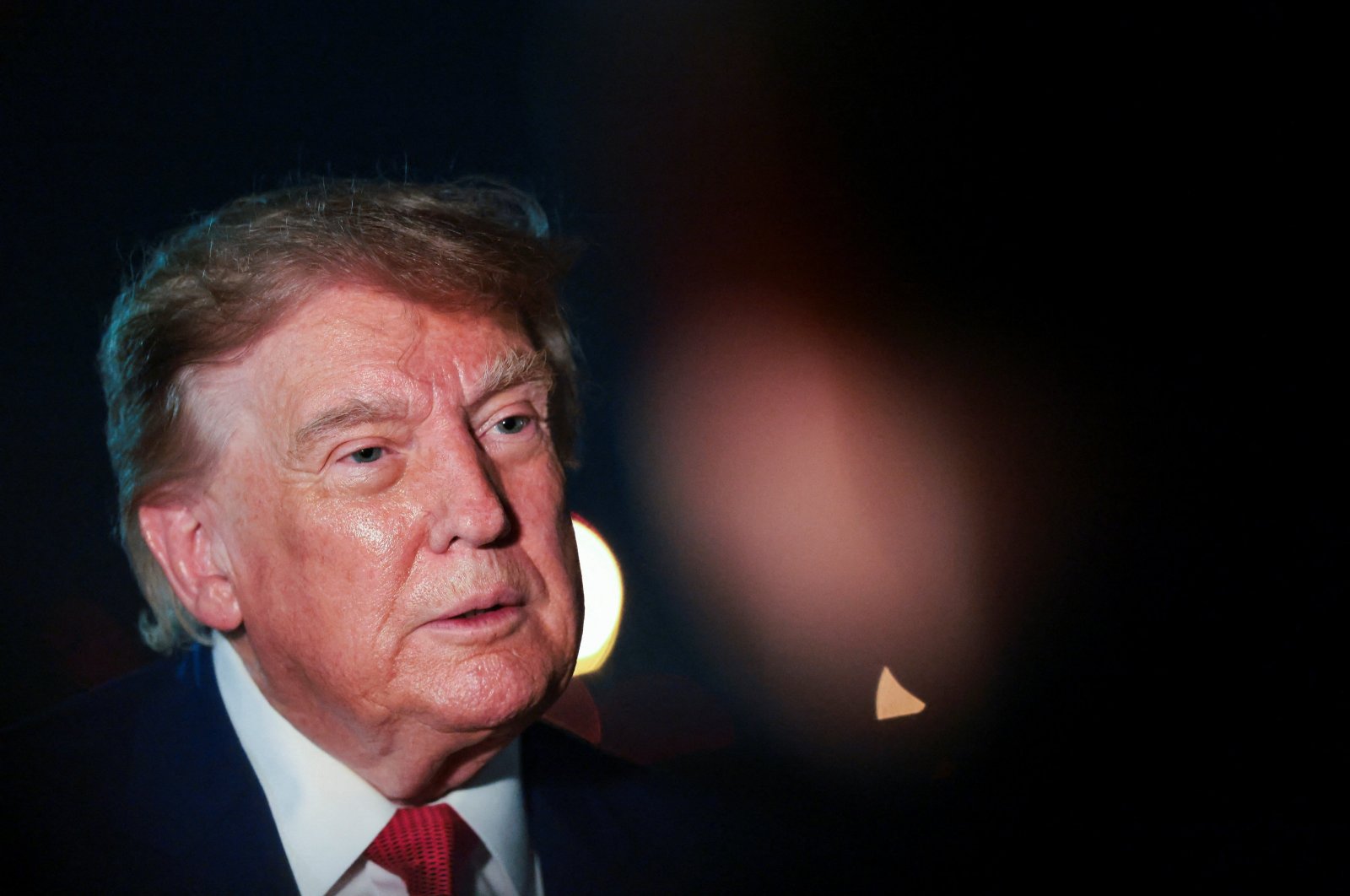 Trump opts for 'low-key' tactics to weigh economic pressure on Iran; claims no urgency as U.S. has 'total control' of Strait of Hormuz