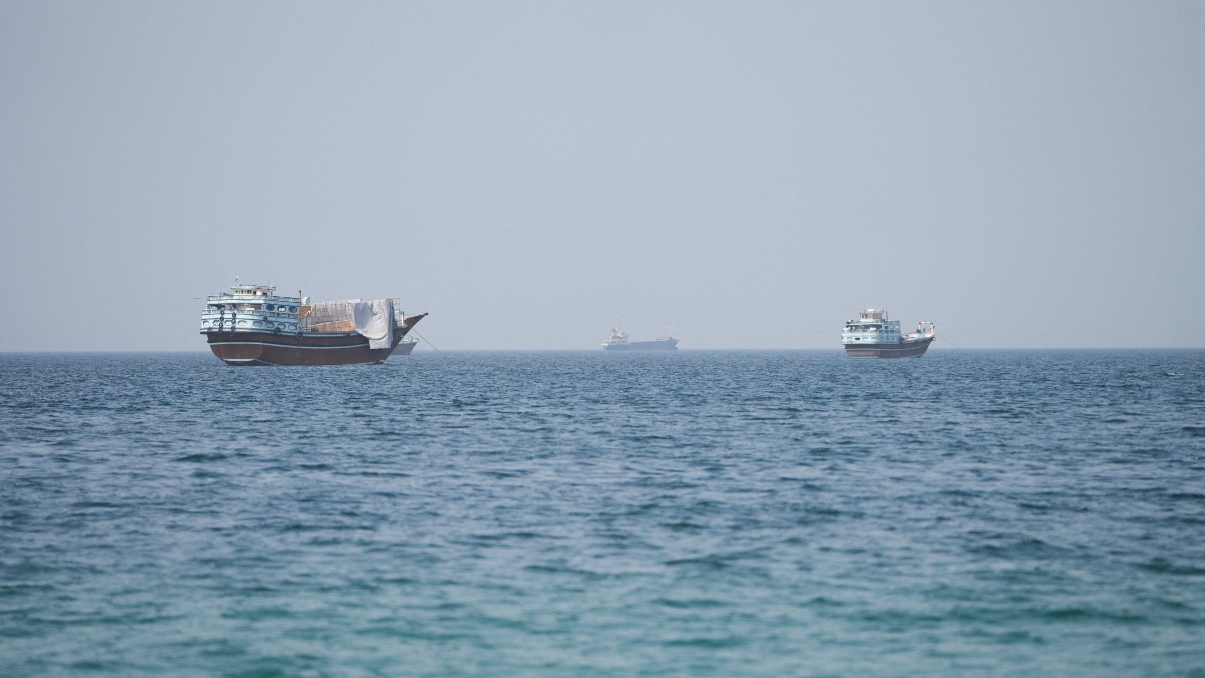 Vessels near the Strait of Hormuz, as seen from Musandam, Oman, Aug. 6, 2026. (Reuters Photo)