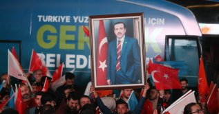 Supporters listen as President Recep Tayyip Erdoğan speaks at AK Party headquarters on local government elections, Ankara, Türkiye, April 1, 2024. (Getty Images Photo)