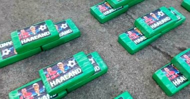 This image from a video released by Ecuador National Police, shows alleged bricks of cocaine which Ecuadorian police removed from a truck, Carchi, Ecuador, Aug. 12, 2026. (AP Photo)