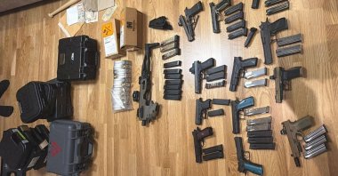 Several items are pictured during a police operation targeting the Alihan Kuriş network in Ankara, Türkiye, Aug. 13, 2026. (AA Photo)