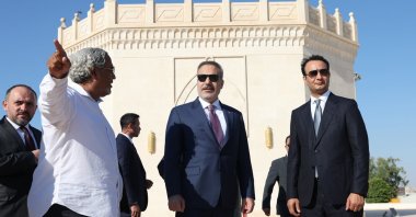 Foreign Minister Hakan Fidan visits the grave of Omar Mukhtar, Libya’s national symbol and legendary hero, during his visit, Benghazi, Libya, Aug. 12, 2026. (AA Photo)