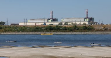 Members of the Water Management Authority prepare the construction of a riverbed sill to raise the Danube's water level near the Paks Nuclear Power Plant, Dunaszentbenedek, Hungary, Aug. 13, 2026. (Reuters Photo)
