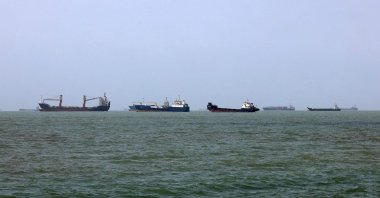Vessels transit the Strait of Hormuz off Bandar Abbas, southern Iran, Aug.10, 2026. (AFP Photo)