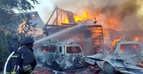 Firefighters put out a fire at the site of a reported Russian strike, amid Russia's attack on Ukraine, in a location given as Sumy Region, Ukraine, in this screengrab from a handout video released Aug. 14, 2026.  (Reuters Photo)