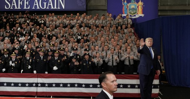 U.S. President Donald Trump waves during an event at David S. Mack Center for Training and Intelligence in Garden City, New York, U.S., Aug. 14, 2026. (Reuters Photo)