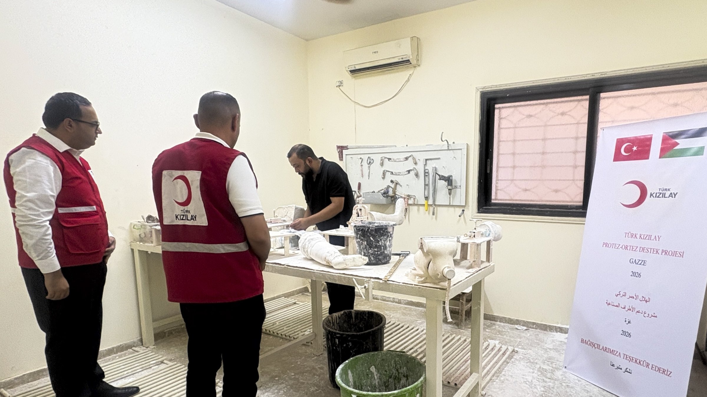 Turkish Red Crescent members during the launch of the prosthesis and orthotics support project, Gaza, Palestine, Aug. 6, 2026. (Courtesy of Turkish Red Crescent)