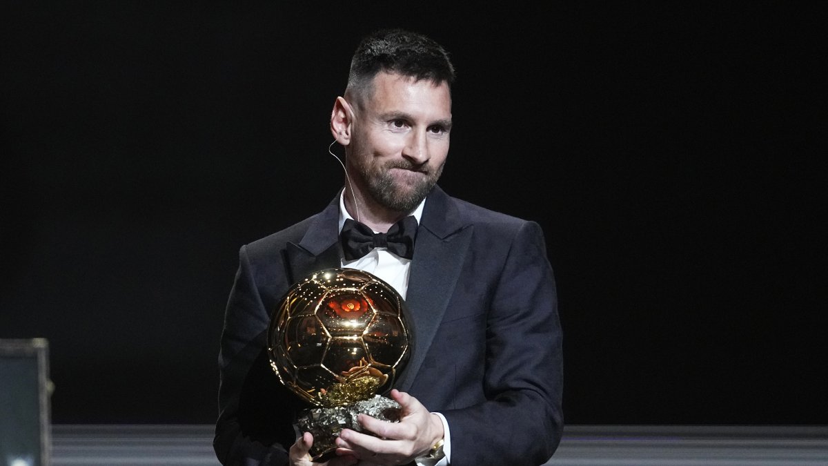 Inter Miami's and Argentina's national team player Lionel Messi receives the 2023 Ballon d'Or trophy during the 67th Ballon d'Or (Golden Ball) award ceremony at Theatre du Chatelet, Paris, France, Oct. 30, 2023. (AP Photo)