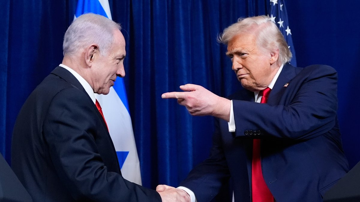 President Donald Trump shakes hands with Israel's Prime Minister Benjamin Netanyahu during a news conference at Mar-a-Lago, Monday, Palm Beach, U.S., Dec. 29, 2025. (AP Photo)