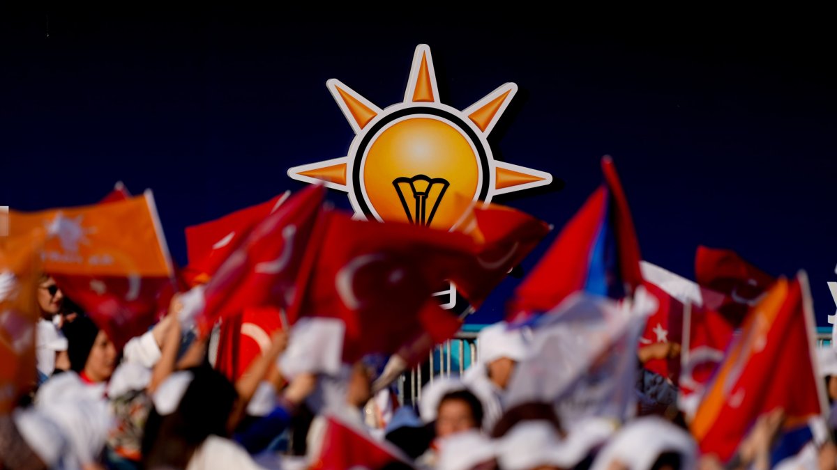 AK Party supporters wave flags against the backdrop of lightbulb logo of the party during the anniversary celebrations, Ankara, Türkiye, Aug. 14, 2026. (AA Photo)