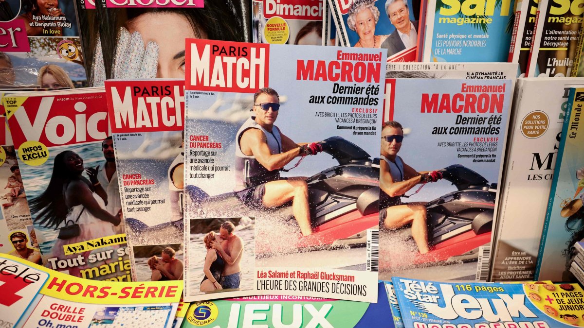 This photograph shows the cover of the French magazine "Paris Match," depicting France's President Emmanuel Macron on a jet ski during his holiday in Bregancon, south-eastern France, Paris, Aug. 14, 2026.