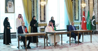 President Recep Tayyip Erdogan (L) is waiting to sign the joint defense agreement with Saudi Arabia's Crown Prince Mohammed bin Salman (C) and Pakistani Prime Minister Shahbaz Sharif, Mecca, Saudi Arabia, Aug. 7, 2026. (AA Photo)