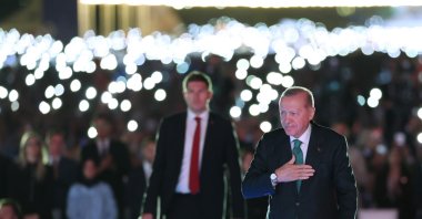 President Recep Tayyip Erdoğan greets the audience at an AK Party event, Ankara, Türkiye, Aug. 14, 2026. (İHA Photo)