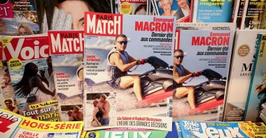 This photograph shows the cover of the French magazine "Paris Match," depicting France's President Emmanuel Macron on a jet ski during his holiday in Bregancon, south-eastern France, Paris, Aug. 14, 2026.