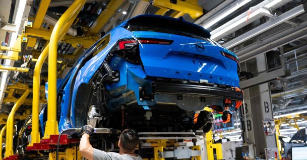 An employee works on a production line of the car brand Opel, assembling Opel Astra passenger cars at the company’s plant, Ruesselsheim, Germany, June 30, 2026. (AFP Photo)