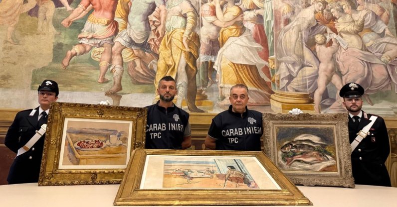 The Italian Carabinieri pose near three artworks recovered following a police operation (From L-R): "Tasse et plat de cerises" ("Still Life with Cherries") a pencil and watercolor by Paul Cezanne, "Odalisque Sur La Terrasse" ("Odalisque on the Terrace")  a color aquatint by Henri Matisse and "Les Poissons" ("Fish") a painting by Pierre Auguste Renoir, Parma, Italy, Aug. 14, 2026. (AP Photo)