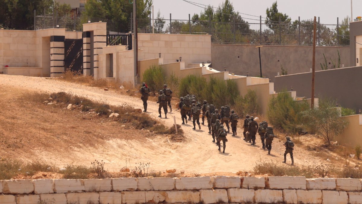 Israeli troops arrive during a military raid in the town of Qusra, south of Nablus, West Bank, Aug. 16, 2026. (EPA Photo)