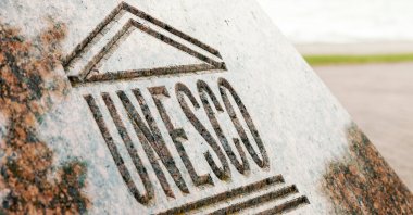 An undated close up view of UNESCO World Heritage sign carved on stone. (Shutterstock Photo)