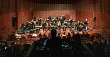 Palestinian musicians perform on stage during the Jerusalem Festival, held at the Yabous Cultural Centre after a two-year hiatus, in East Jerusalem, Aug.16, 2026. (AFP Photo)