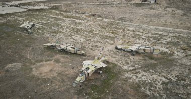 Decommissioned planes are seen at the Abu al-Duhur military airport, east of Idlib, Syria, Dec. 7, 2024. (AP Photo)