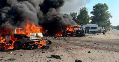 Vehicles burn after Russian drone strikes in the town of Pechenihy, amid Russia's attack on Ukraine in Kharkiv region, Ukraine, Aug. 18, 2026. (Reuters Photo)