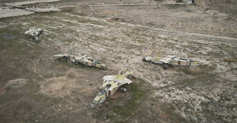 Decommissioned planes are seen at the Abu al-Duhur military airport, east of Idlib, Syria, Dec. 7, 2024. (AP Photo)