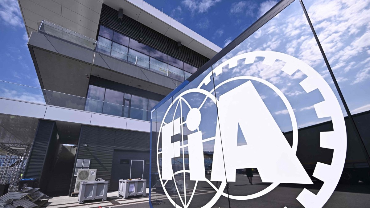 The logo of FIA is seen with the Hungaroring's new main building in the background during a press presentation at the renovated Mogyorod circuit, Budapest, Hungary, July 21, 2026. (AFP Photo)